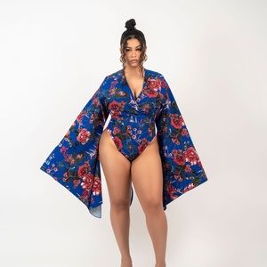 Beautiful handmade blue floral body suit